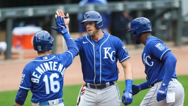 May 2, 2021; Minneapolis, Minnesota, USA; Kansas City Royals third baseman Hunter Dozier (17) celebrates with left fielder Andrew Benintendi (16) and right fielder Jorge Soler (12) after Dozier hit a three-run home run against the Minnesota Twins in the fourth inning at Target Field. Mandatory Credit: David Berding-USA TODAY Sports
